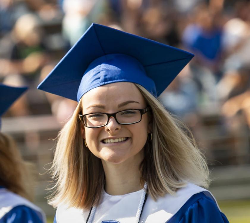SMILING AT GRADUATION